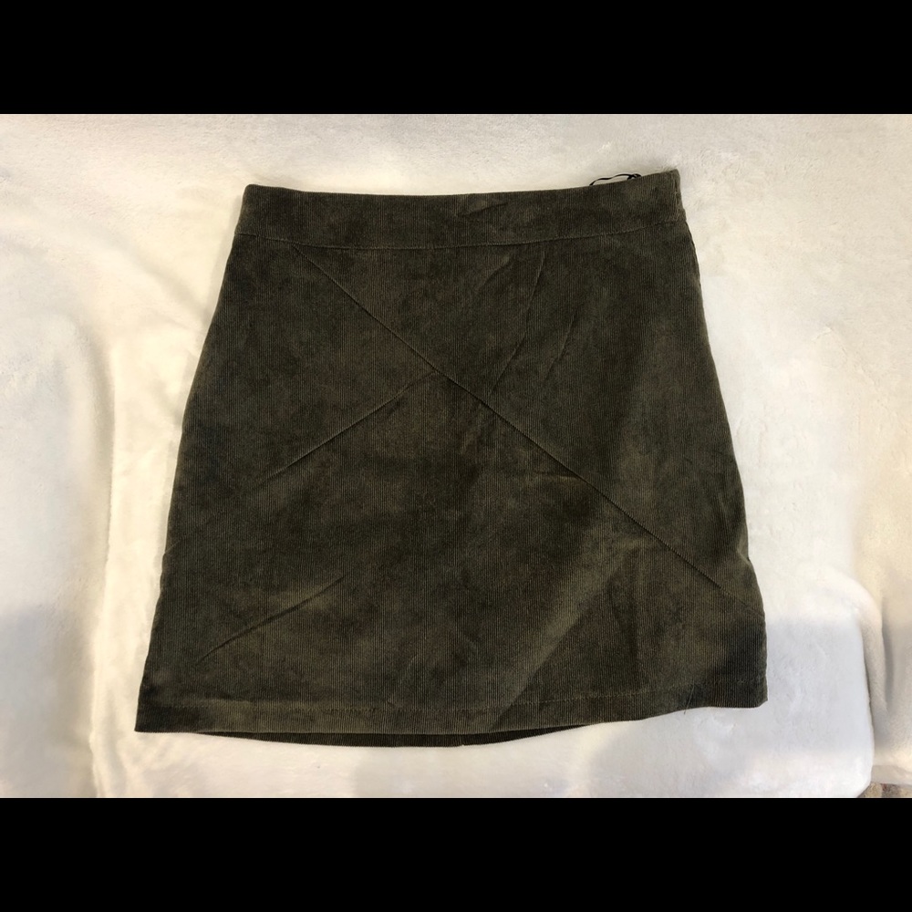 Green corduroy mini skirt